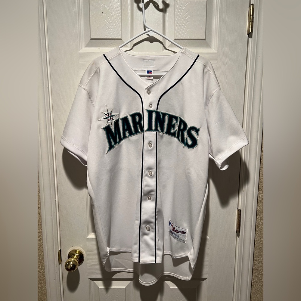 BRAND NEW with tags never worn Mariners Ichiro authentic Jersey.